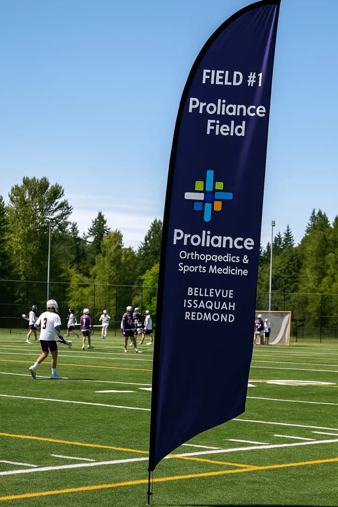 Illustrative mock-up of a Field #1 feather flag using Proliance branding as an example